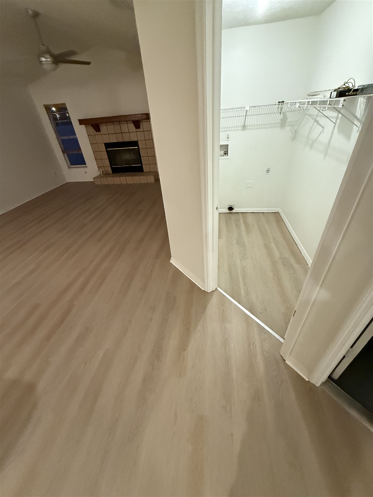 Interior remodel with wood-look flooring by 3DCON LLC
