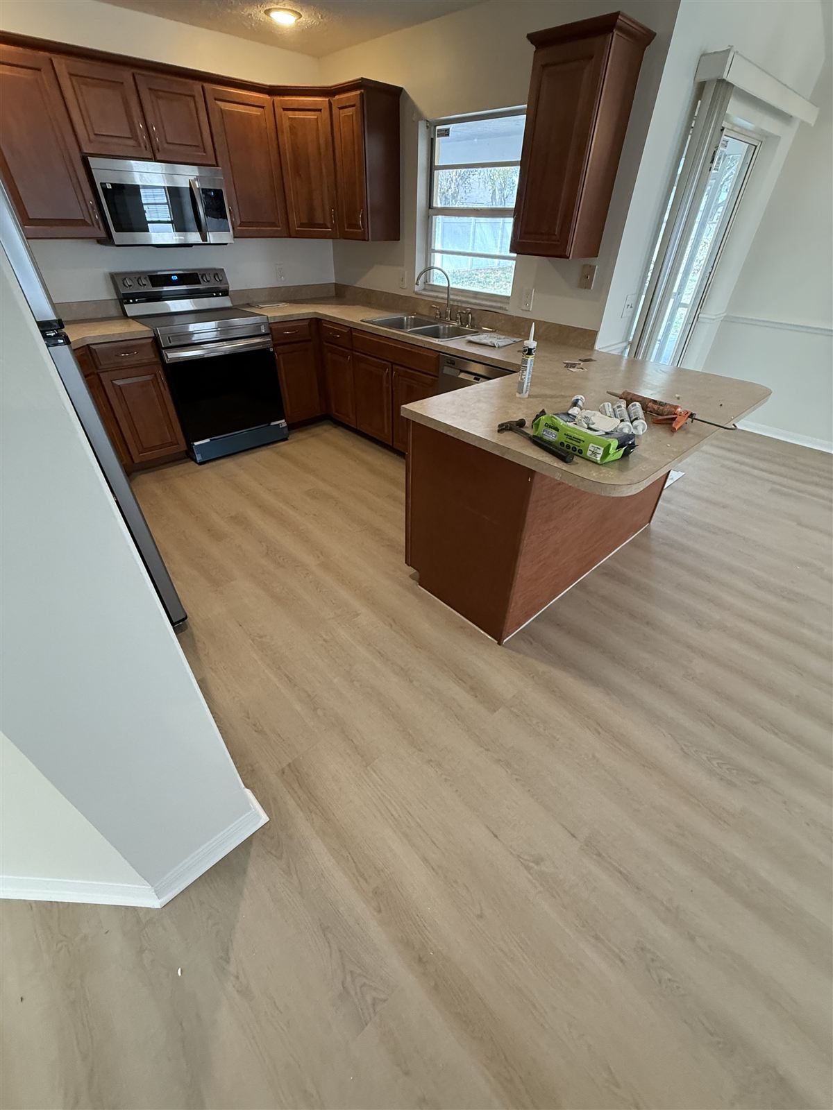 Custom kitchen remodel with stainless appliances by 3DCON LLC