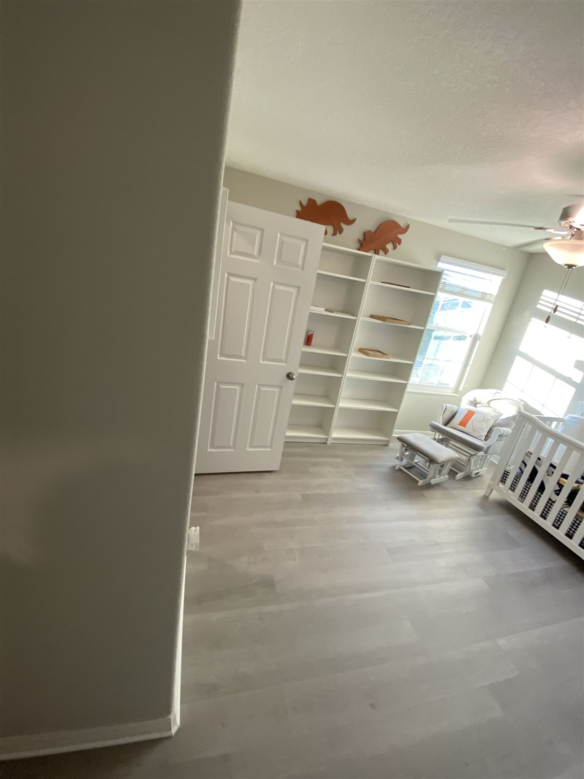 Bedroom remodel with built-in shelving by 3DCON LLC