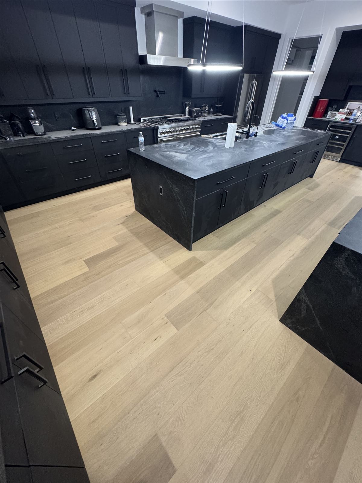 Modern black cabinet kitchen remodel by 3DCON LLC in Brandon, FL