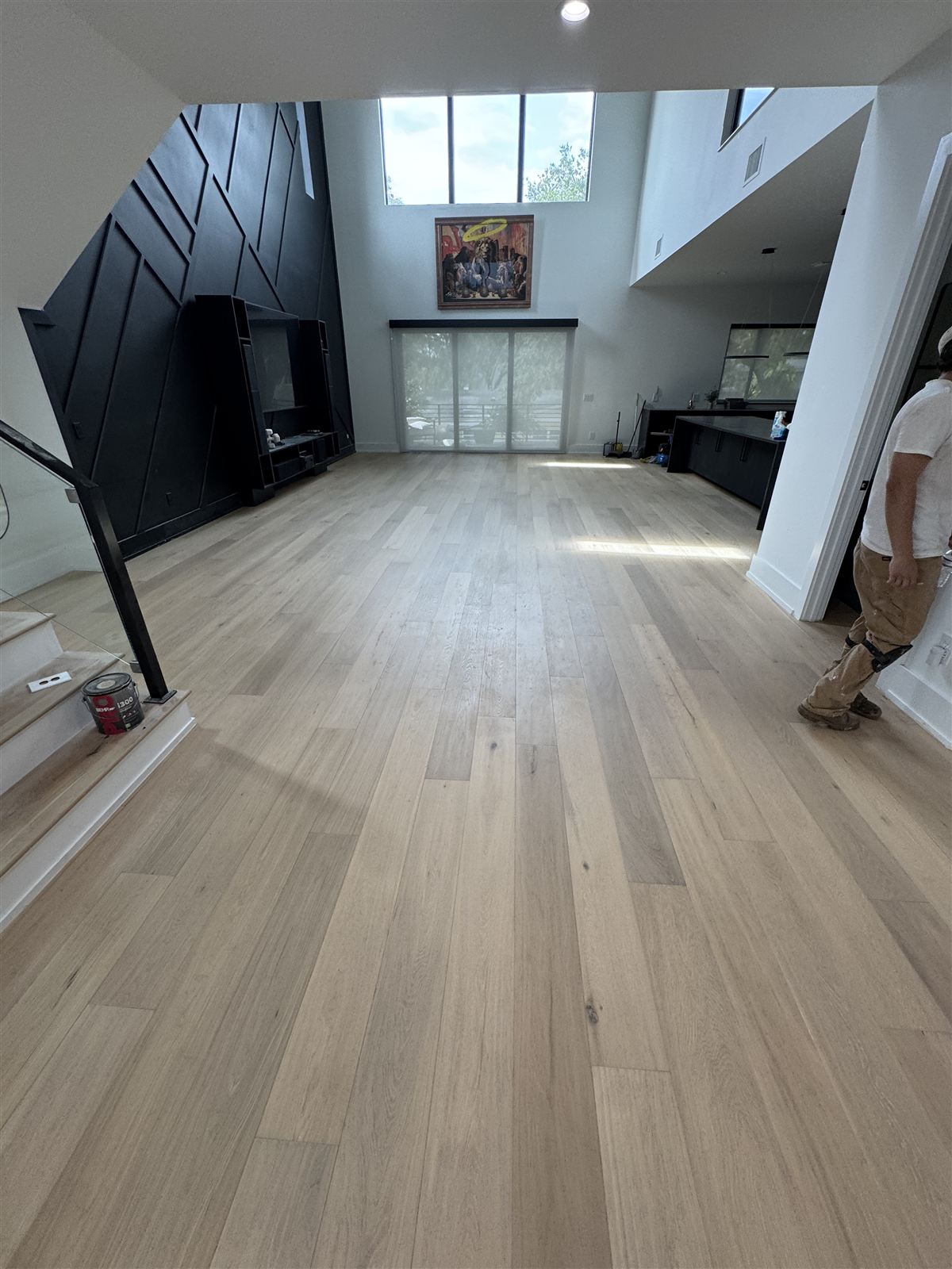 Open living space remodel with high ceilings by 3DCON LLC