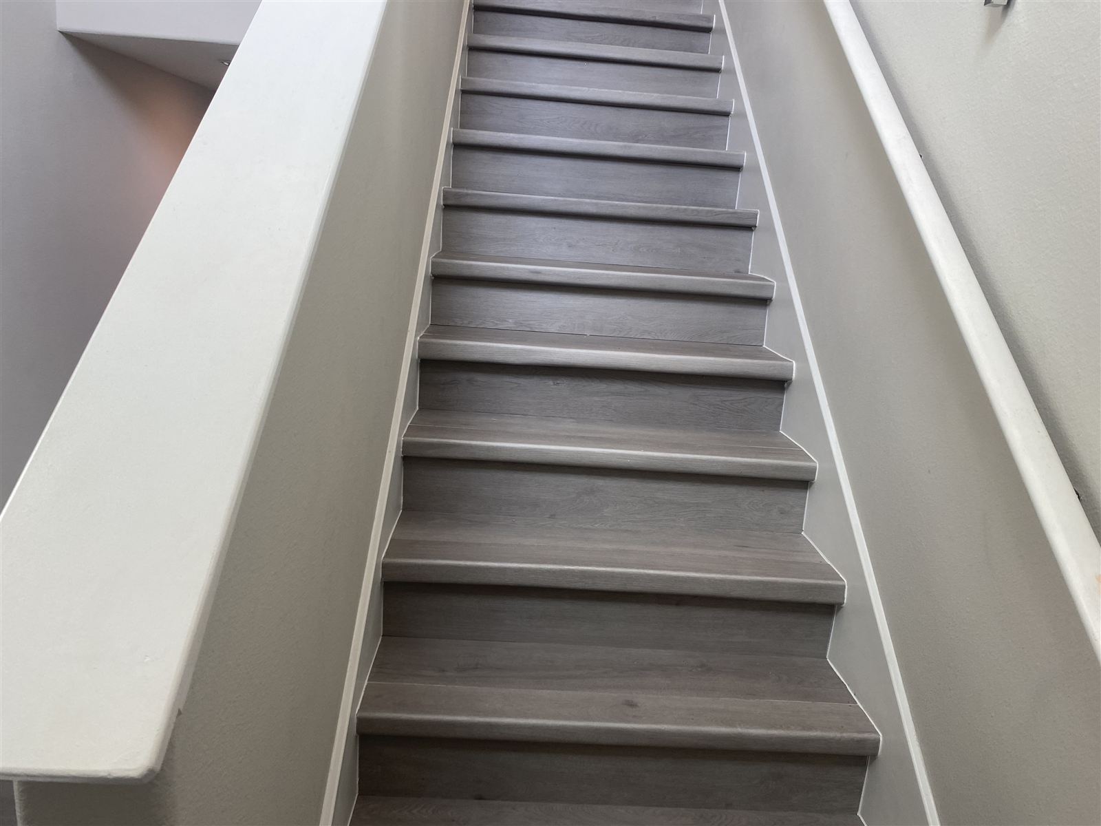Staircase flooring installation by 3DCON LLC